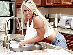 Clitoris, Stunning cougar soaks herself on the kitchen counter and rubs her juicy pink